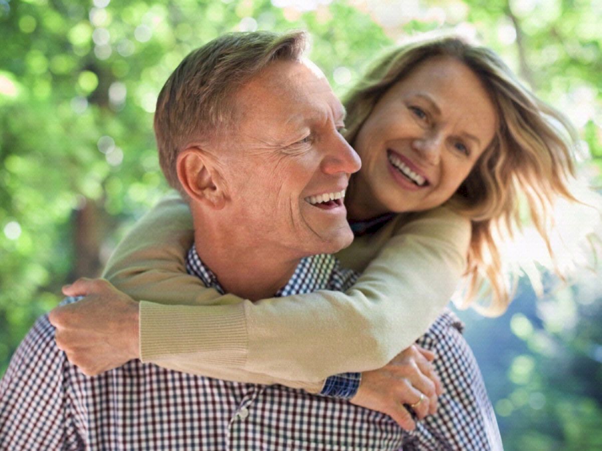 Couple embracing one another