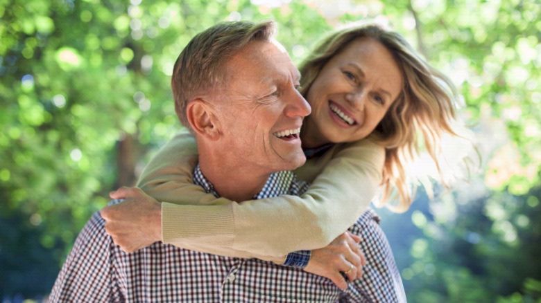 Couple embracing one another