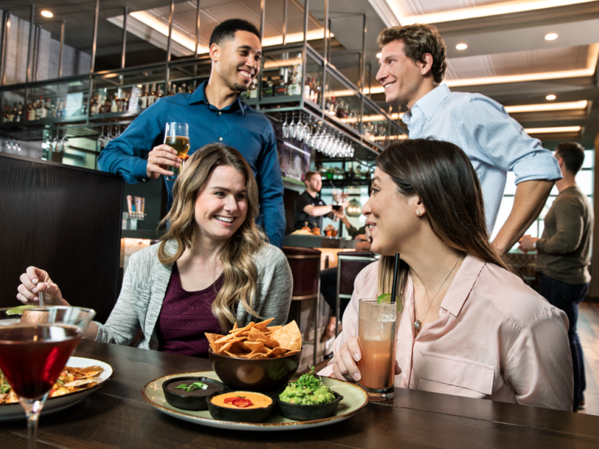 Friends dining at Block T Bar