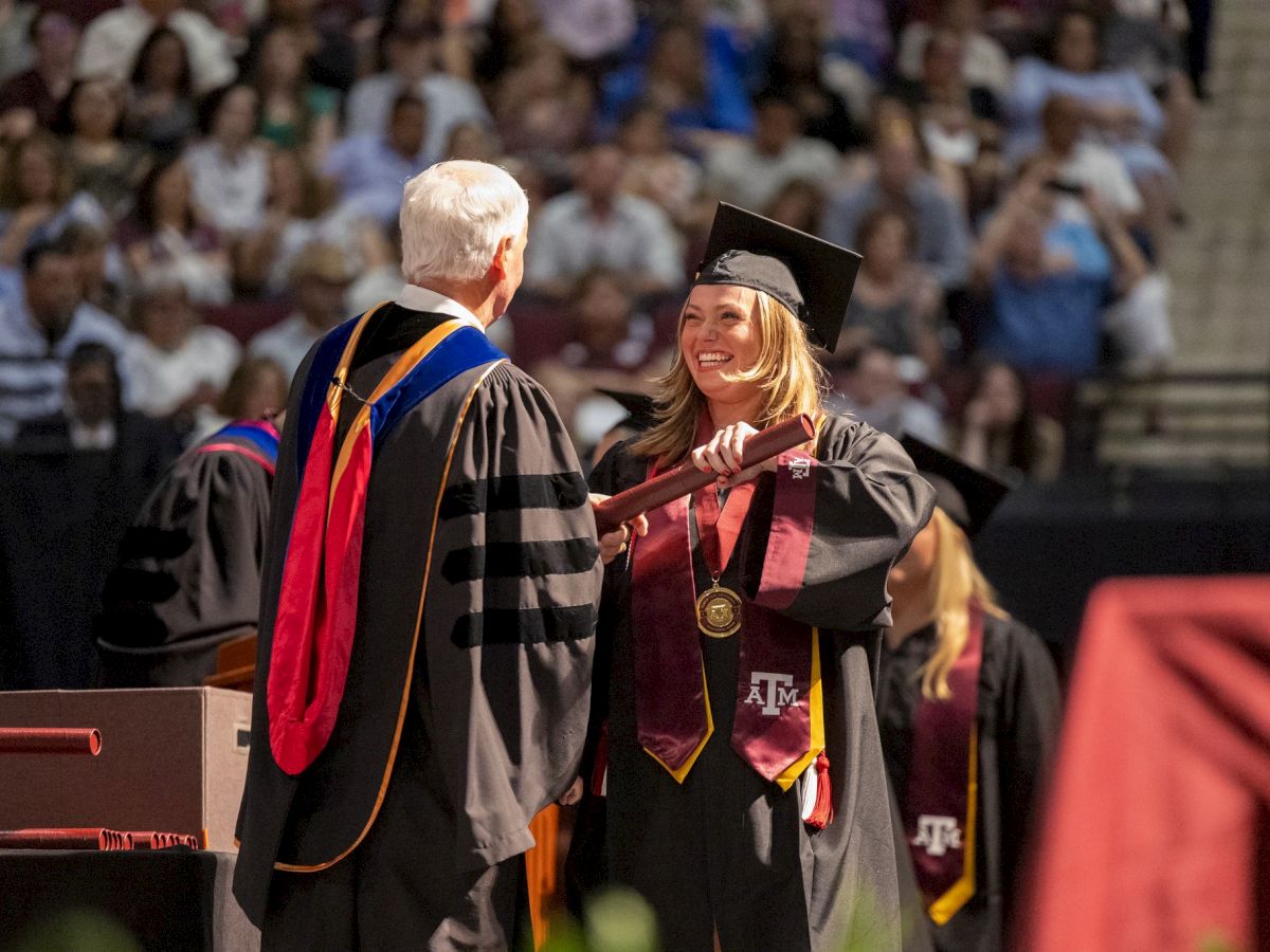 Student receiving diploma