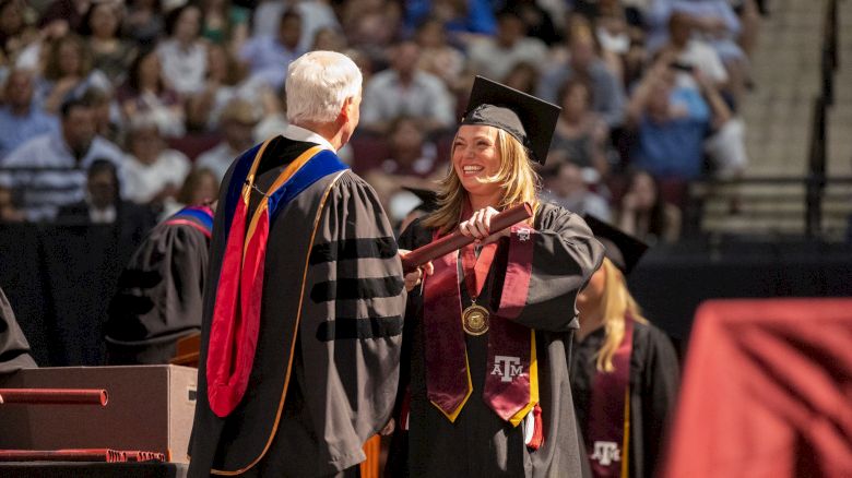 Student receiving diploma