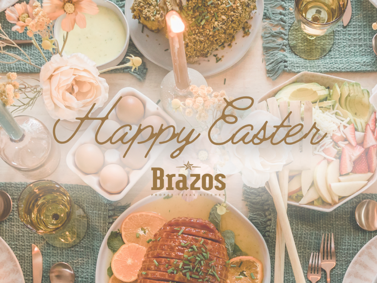 A festive Easter table setup with floral decorations, candles, dishes, and a "Happy Easter" message from "Brazos" in the center.